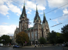 powiększ