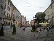 powiększ