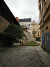 powiększ