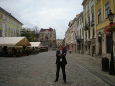 powiększ